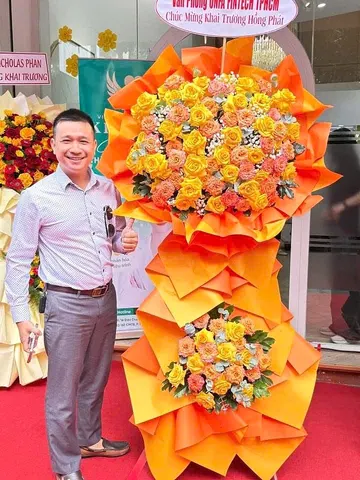 Kệ hoa mừng khai trương tone cam cỡ lớn